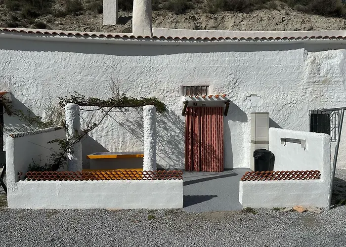 Фото Alojamientos Cuevas Tiana El Aljibete