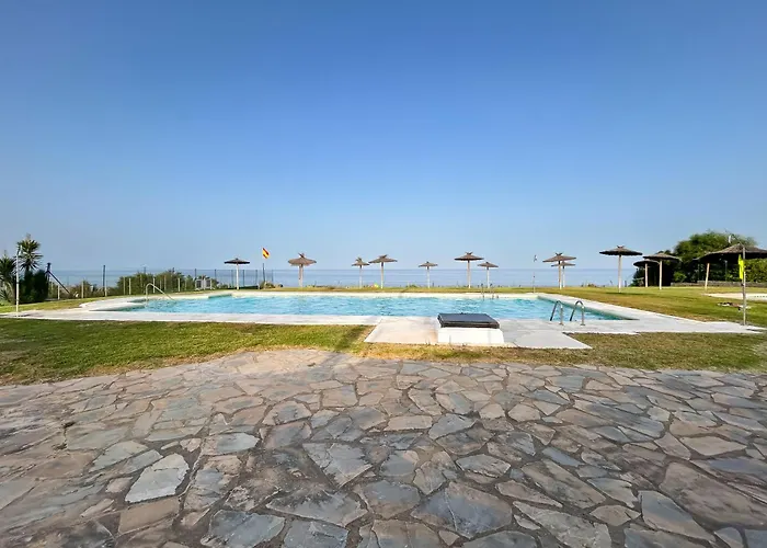 صورة Casa Adosada En Segunda Linea De Playa En مانيلفا